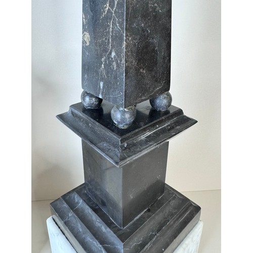 110 - A pair of 19th Century French white and black marble obelisks on stands, 49cms h