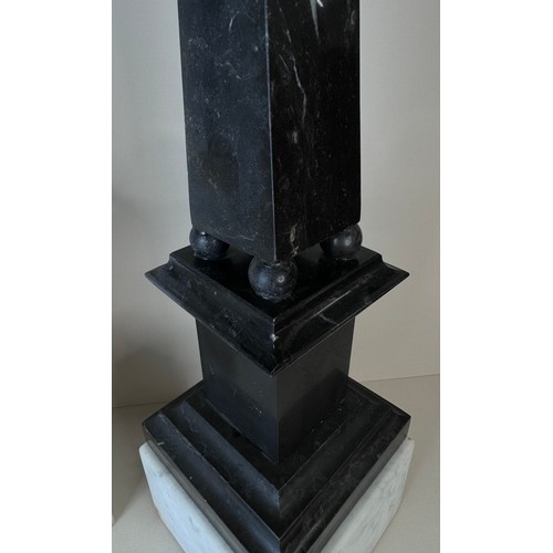 110 - A pair of 19th Century French white and black marble obelisks on stands, 49cms h