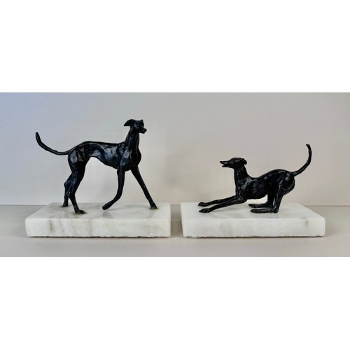 111 - A pair of early 20th Century French bronze greyhounds, on marble socles, tallest; 13cms h