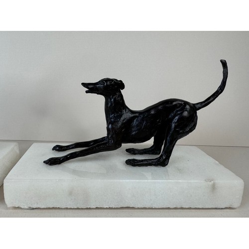 111 - A pair of early 20th Century French bronze greyhounds, on marble socles, tallest; 13cms h