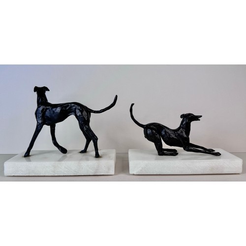 111 - A pair of early 20th Century French bronze greyhounds, on marble socles, tallest; 13cms h