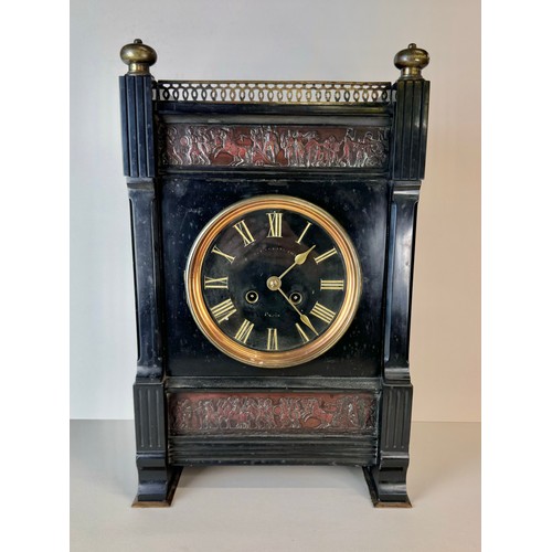 115 - A 19th Century French Belge noir, gilt metal and copper mantel clock, 43cms h