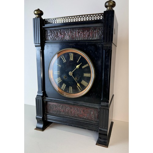 115 - A 19th Century French Belge noir, gilt metal and copper mantel clock, 43cms h