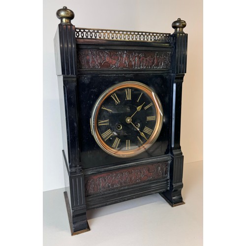 115 - A 19th Century French Belge noir, gilt metal and copper mantel clock, 43cms h