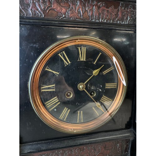 115 - A 19th Century French Belge noir, gilt metal and copper mantel clock, 43cms h