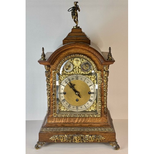 116 - An early 20th Century oak and gilt metal mounted fusee bracket clock, 56cms h