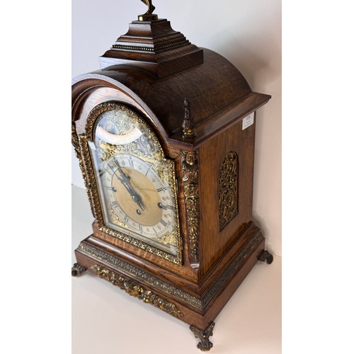 116 - An early 20th Century oak and gilt metal mounted fusee bracket clock, 56cms h