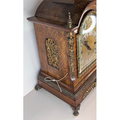 116 - An early 20th Century oak and gilt metal mounted fusee bracket clock, 56cms h