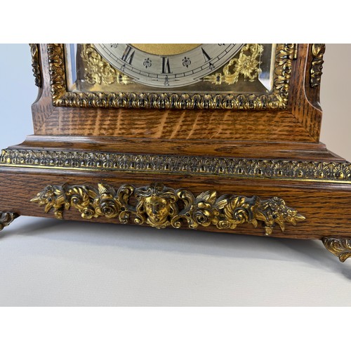 116 - An early 20th Century oak and gilt metal mounted fusee bracket clock, 56cms h