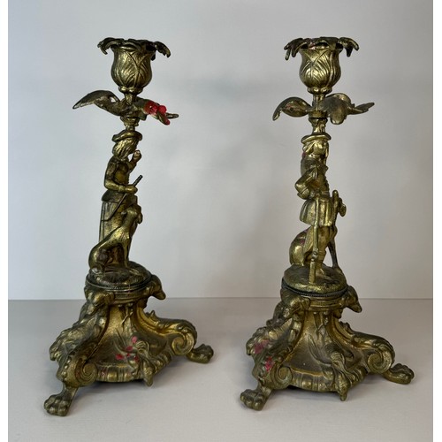 120 - A pair of 19th century figural brass candlesticks, 27cms h