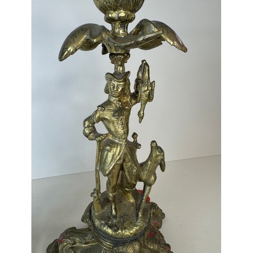 120 - A pair of 19th century figural brass candlesticks, 27cms h