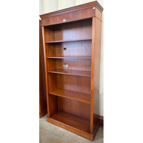 370 - A carved mahogany open bookcase