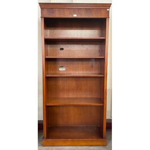 370 - A carved mahogany open bookcase