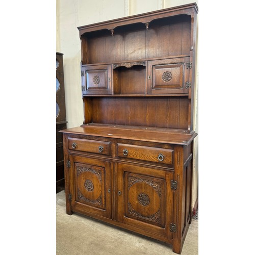 372 - A carved oak dresser