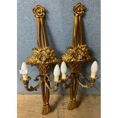 431 - A pair of French Louis XIV style gilt wall lights