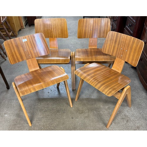 242 - A set of four Hille beech and bent plywood Hillestack chairs, designed by Robin Day