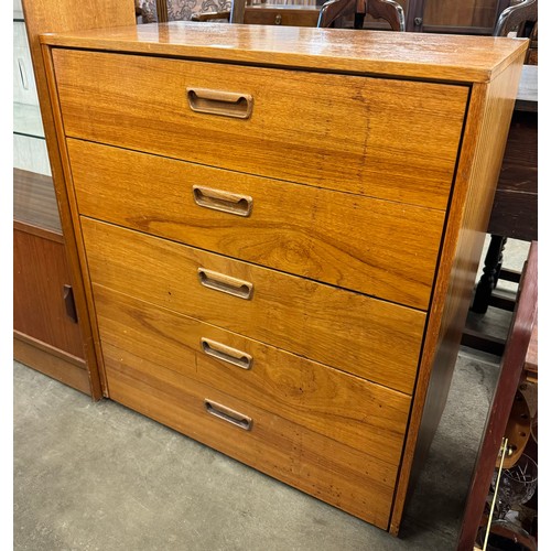 249 - A teak chest of drawers