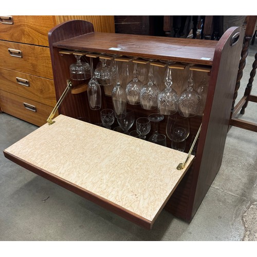 250 - A tola wood cocktail cabinet