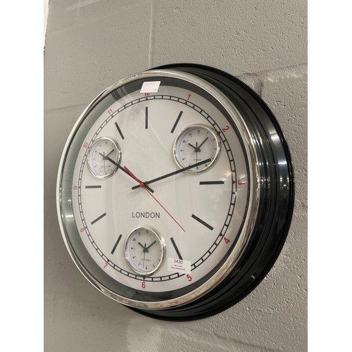 1410 - A multi dial wall clock