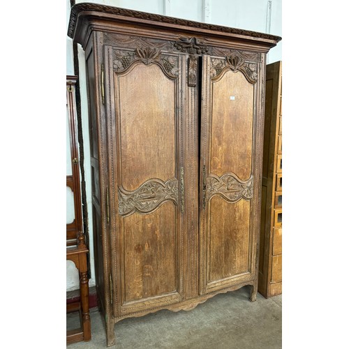 271 - An 18th Century French provincial carved oak armoire