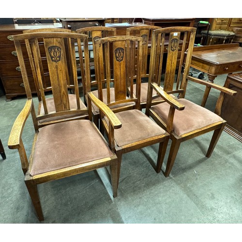 261 - A set of six Art Nouveau oak dining chairs