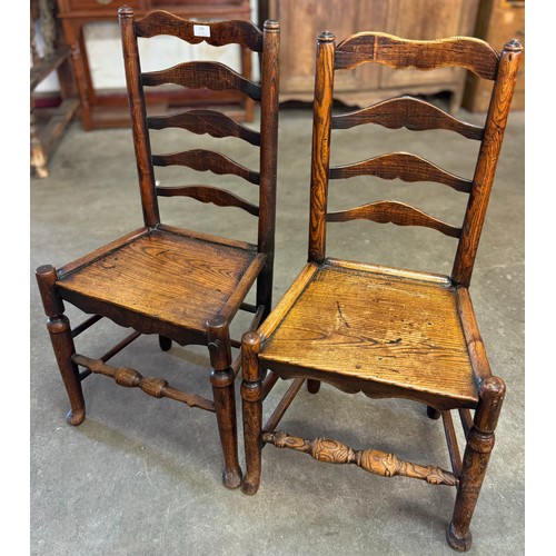 266 - A pair of similar 18th Century elm ladderback chairs