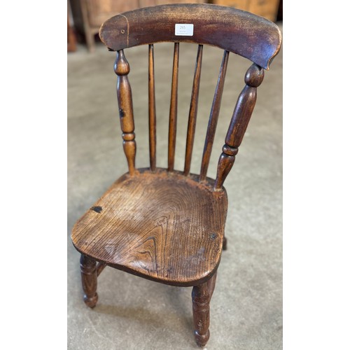 265 - A Victorian childs elm chair