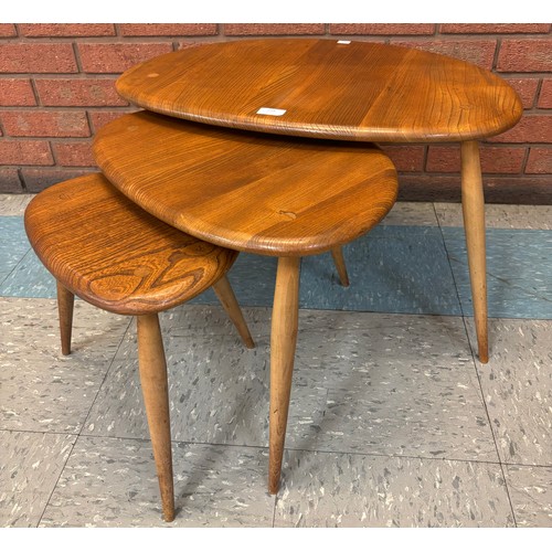 218 - An Ercol Blonde elm and beech pebble shaped nest of tables