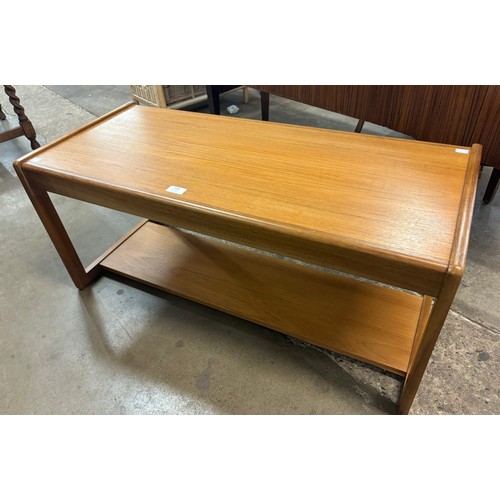 228 - A teak coffee table