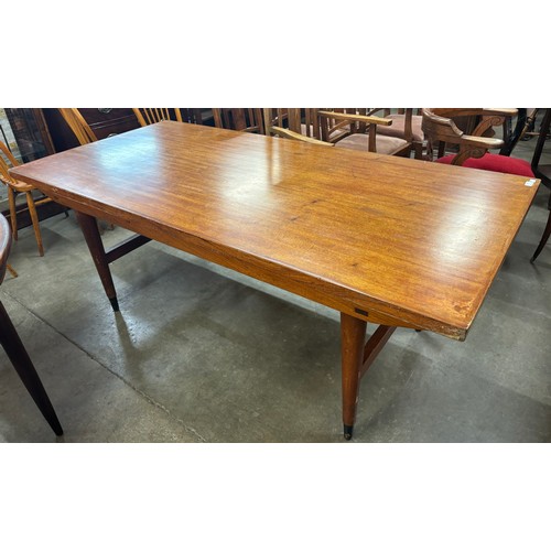 232 - A Gordon Russell teak dining table