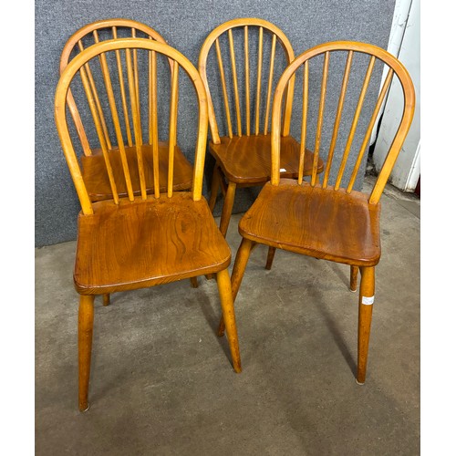 233 - A set of four Ercol style elm and beech chairs