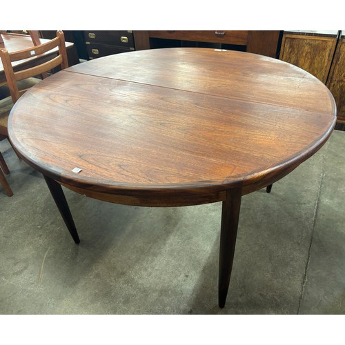 236 - A G-Plan Fresco teak circular extending table