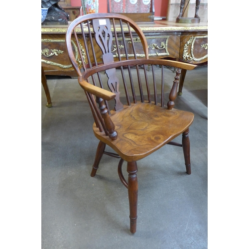 164 - A 19th Century elm and yew Windsor chair