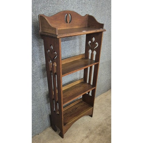 176 - An Arts and Crafts oak open bookcase