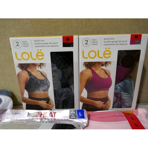 6155 - Pallet of assorted clothing inc Lole sports bras, Saint eve and Kirkland Signature, Estimated RRP £5... 