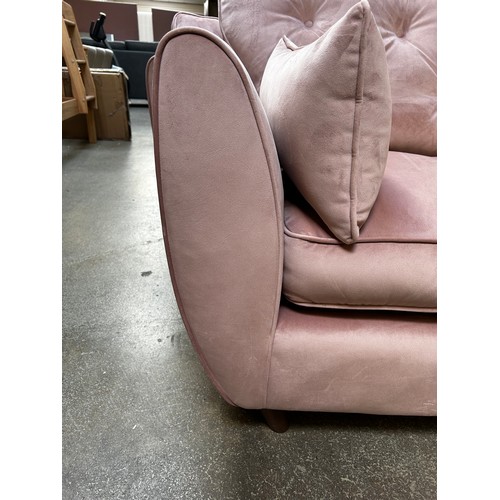 1525 - A Hoxton bubblegum pink button back velvet three seater sofa RRP £799