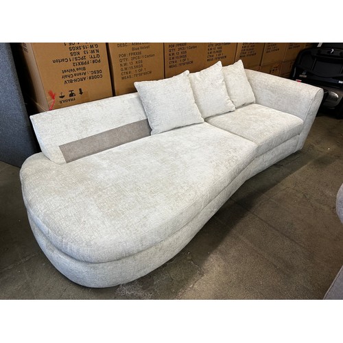 1549 - An off white upholstered open end three seater sofa (missing cushions)