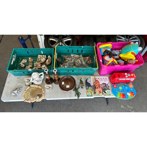 2372 - A large assortment of miscellaneous items including a selection of plastic dinosaur toys, a Natural ... 