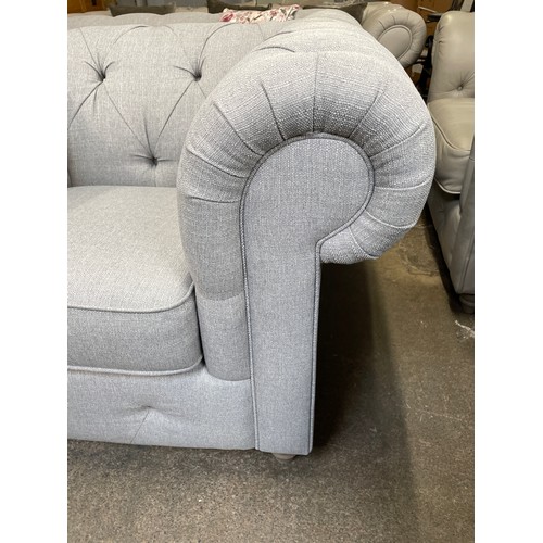 1513A - A grey weave Chesterfield three seater sofa and armchair