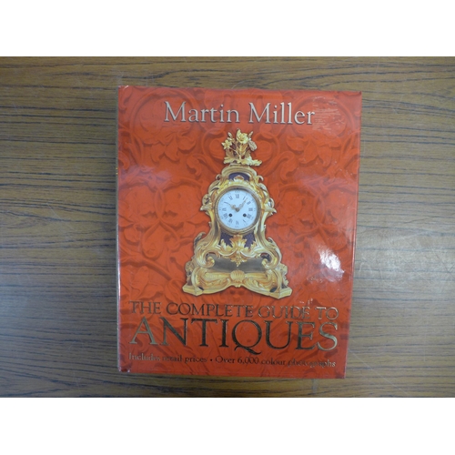 2260 - A collection of ten books on antiques and collectables and two books on tropical fish