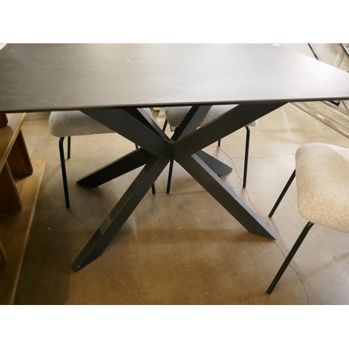 1316 - A black ceramic dining table and four grey boucle chairs, chipped top  *This lot is subject to VAT