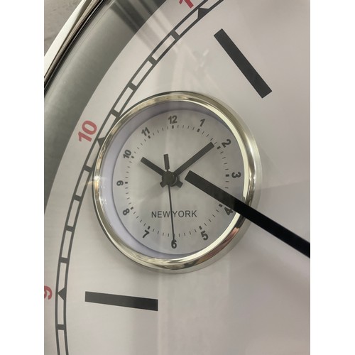 1391 - A multi dial wall clock