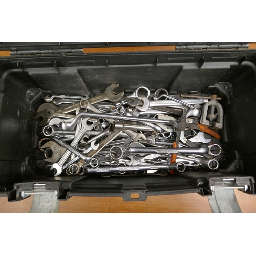 2014 - A black plastic toolbox containing a large quantity of Britool open-ended and ring spanners and a pl... 