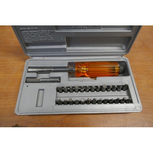 2021 - A 32 piece socket set (1 socket missing) and a 28 piece screwdriver set