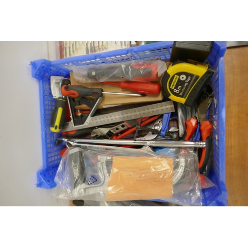 2023 - A quantity of unused and lightly used tools including hammers, screwdrivers, tape measures, wire whe... 