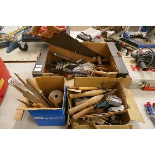 2029 - A mixed lot of woodworking hand tools including: a Spiralux riveter, files, tape measures, a saw, cl... 