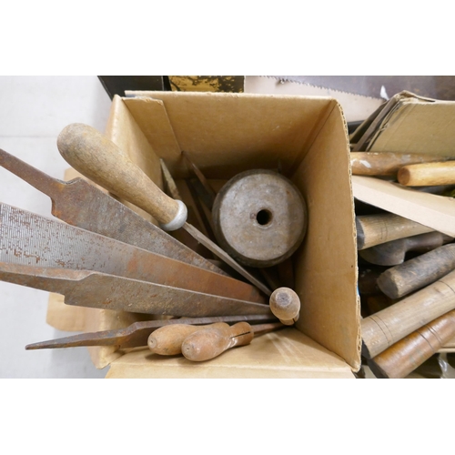 2029 - A mixed lot of woodworking hand tools including: a Spiralux riveter, files, tape measures, a saw, cl... 