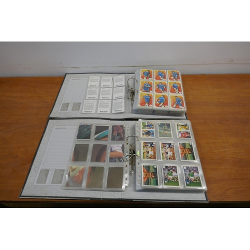 2045 - 2 large folders of collectible cards including Panini football cards, Futerra Formula 1 cars and dri... 