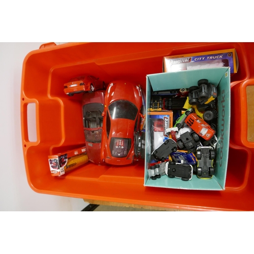 2056 - A box of boxed model buses and trucks and a box of used toy cars including Hot Wheels