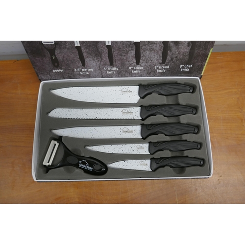 2065 - A Swiss Home 6 piece ceramic coated knife set